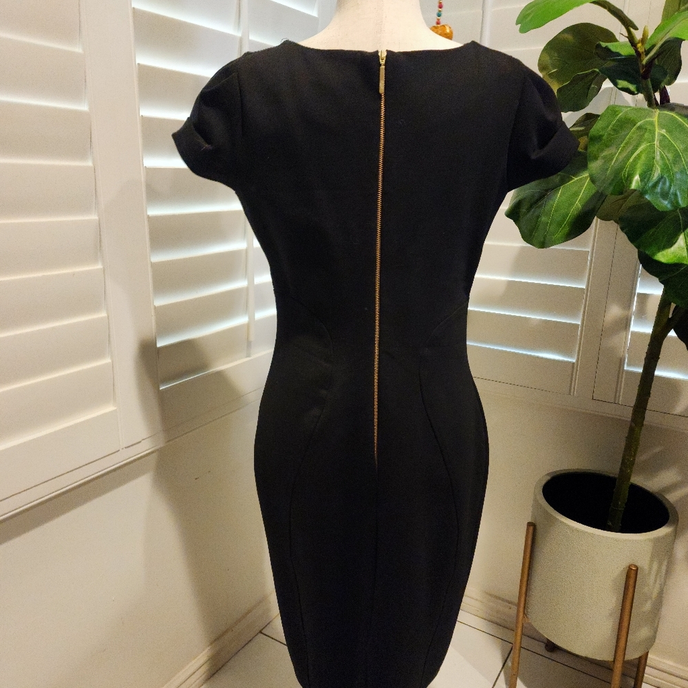 Black fitted knee-length dress
